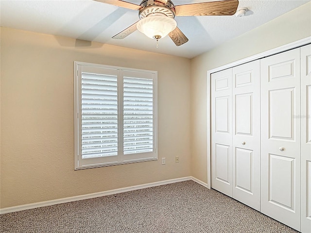 1628 Lullwater Ln, Lutz, FL 33549 - unfurnished bedroom featuring a closet, light carpet, a ceiling fan, and baseboards