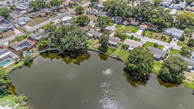 view of property location featuring nearby suburban area and a large body of water