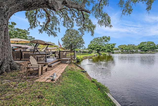 dock area with a deck with water view