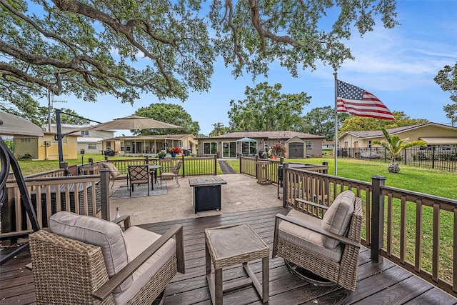 deck with a residential view, outdoor dining area, and outdoor lounge area