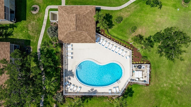 drone / aerial view of a pool