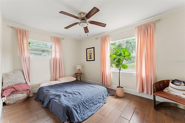 4600 Chancellor St NE, Saint Petersburg, FL 33703 - bedroom with wood finished floors, baseboards, and a ceiling fan
