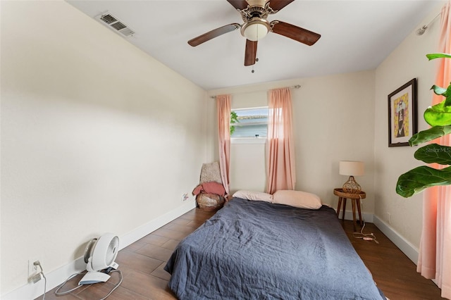 4600 Chancellor St NE, Saint Petersburg, FL 33703 - bedroom with wood finished floors, baseboards, and ceiling fan