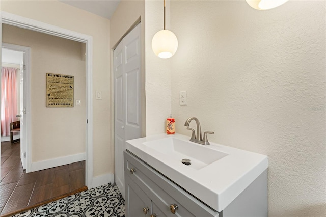 4600 Chancellor St NE, Saint Petersburg, FL 33703 - bathroom featuring vanity, baseboards, and tile patterned floors