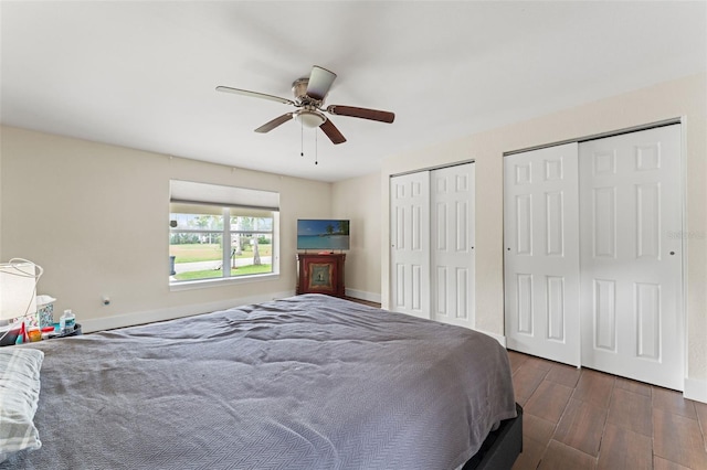 4600 Chancellor St NE, Saint Petersburg, FL 33703 - bedroom with multiple closets, ceiling fan, baseboards, and wood finished floors