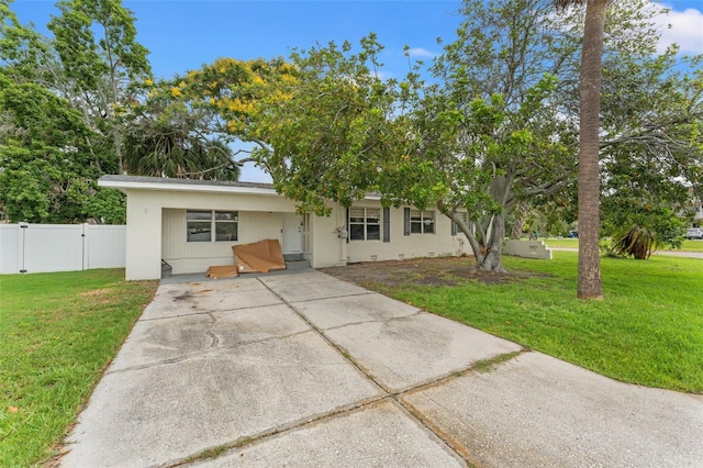 4600 Chancellor St NE, Saint Petersburg, FL 33703 - view of front of property featuring a gate and concrete driveway