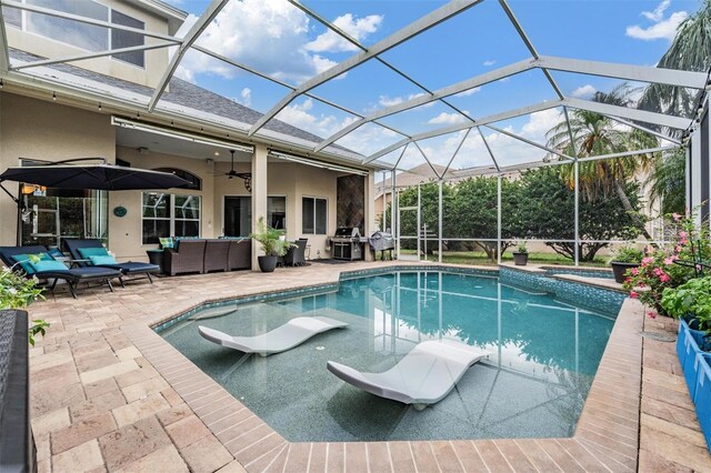 view of swimming pool featuring outdoor lounge area, grilling area, a patio area, and ceiling fan