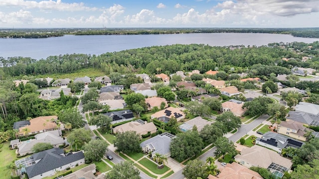 view of property location with nearby suburban area and a nearby body of water