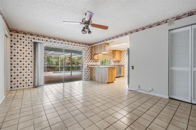 3230 Player Dr, New Port Richey, FL 34655 - unfurnished living room featuring a textured ceiling, ceiling fan, baseboards, wallpapered walls, and light tile patterned flooring