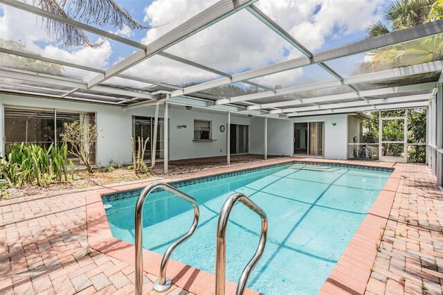 3230 Player Dr, New Port Richey, FL 34655 - swimming pool with a patio and a lanai