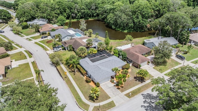 3230 Player Dr, New Port Richey, FL 34655 - aerial perspective of suburban area featuring a large body of water