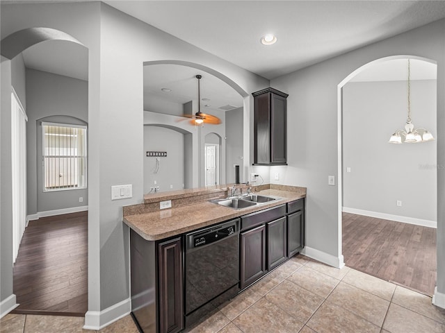 12713 Whitney Meadow Way, Riverview, FL 33578 - kitchen featuring dishwasher, a sink, baseboards, light countertops, and recessed lighting