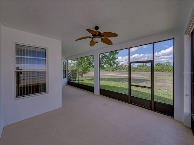 12713 Whitney Meadow Way, Riverview, FL 33578 - unfurnished sunroom with a ceiling fan and healthy amount of natural light