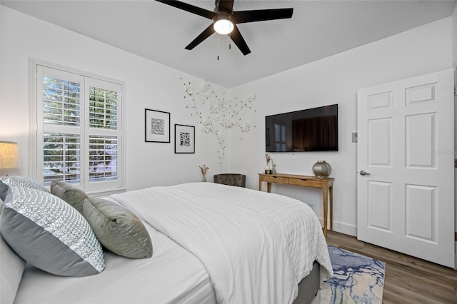 19620 Eagle Crest Dr, Lutz, FL 33549 - bedroom with wood finished floors and a ceiling fan