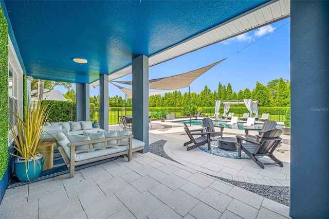 19620 Eagle Crest Dr, Lutz, FL 33549 - view of patio with an outdoor pool, an outdoor living space with a fire pit, and fence