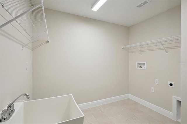 13137 Wellspring Dr, Lithia, FL 33547 - washroom featuring electric dryer hookup and washer hookup