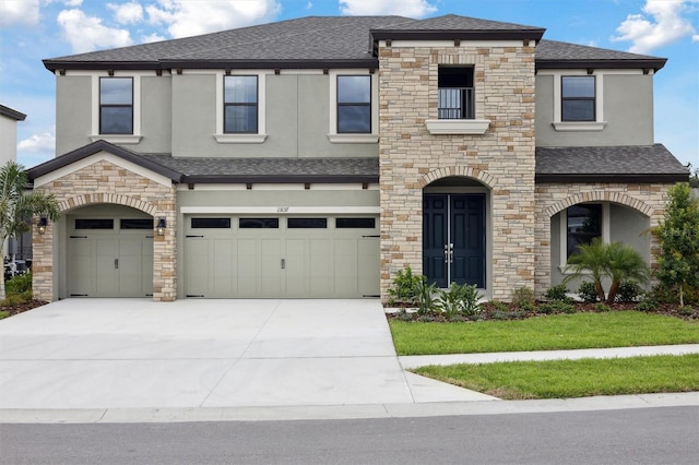 13137 Wellspring Dr, Lithia, FL 33547 - view of front of property with stone siding, roof with shingles, stucco siding, and driveway