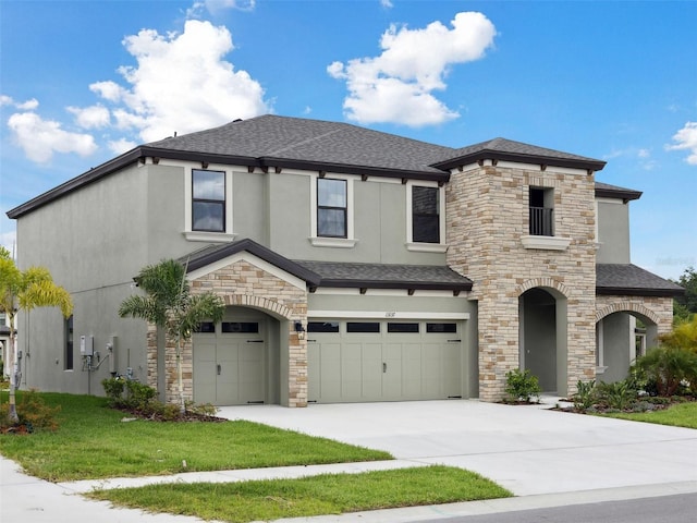 13137 Wellspring Dr, Lithia, FL 33547 - view of front of house featuring roof with shingles, stucco siding, a garage, and stone siding