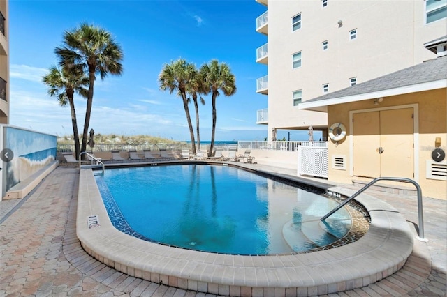 13440 Gulf Blvd Unit 501, Madeira Beach, FL 33708 - community pool featuring a patio