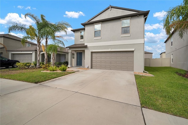 9640 Lemon Drop Loop, Ruskin, FL 33573 - traditional home featuring stucco siding, a garage, and concrete driveway