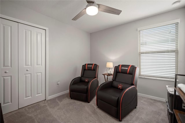 9640 Lemon Drop Loop, Ruskin, FL 33573 - sitting room with a ceiling fan, carpet flooring, and baseboards