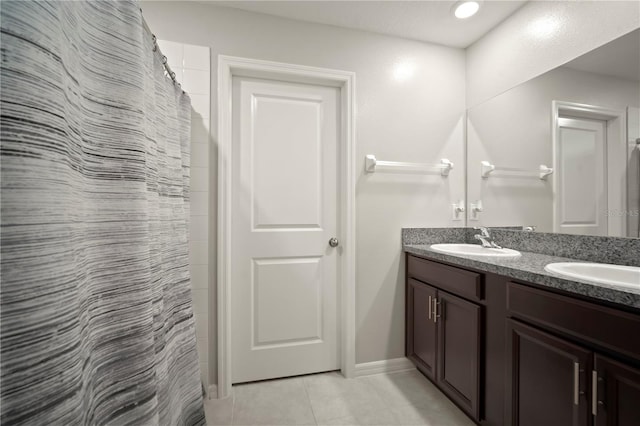 9640 Lemon Drop Loop, Ruskin, FL 33573 - full bathroom with tile patterned flooring and double vanity