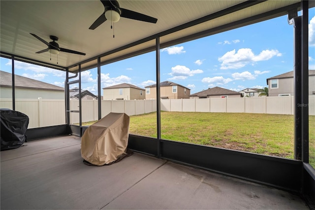 9640 Lemon Drop Loop, Ruskin, FL 33573 - sunroom / solarium featuring a ceiling fan and a residential view