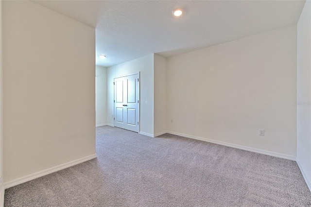 2882 Peony Prairie Ln, Wesley Chapel, FL 33543 - empty room featuring carpet flooring and baseboards