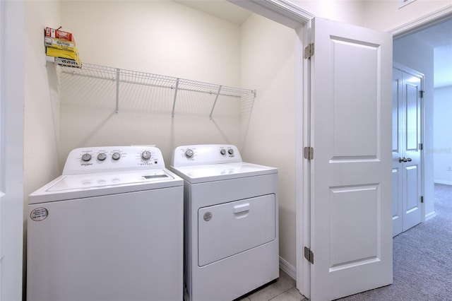 2882 Peony Prairie Ln, Wesley Chapel, FL 33543 - laundry area with independent washer and dryer and light colored carpet