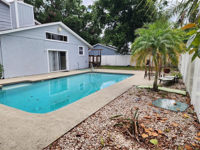 6906 Shady Pl, Tampa, FL 33634 - view of swimming pool with a fenced backyard and a patio