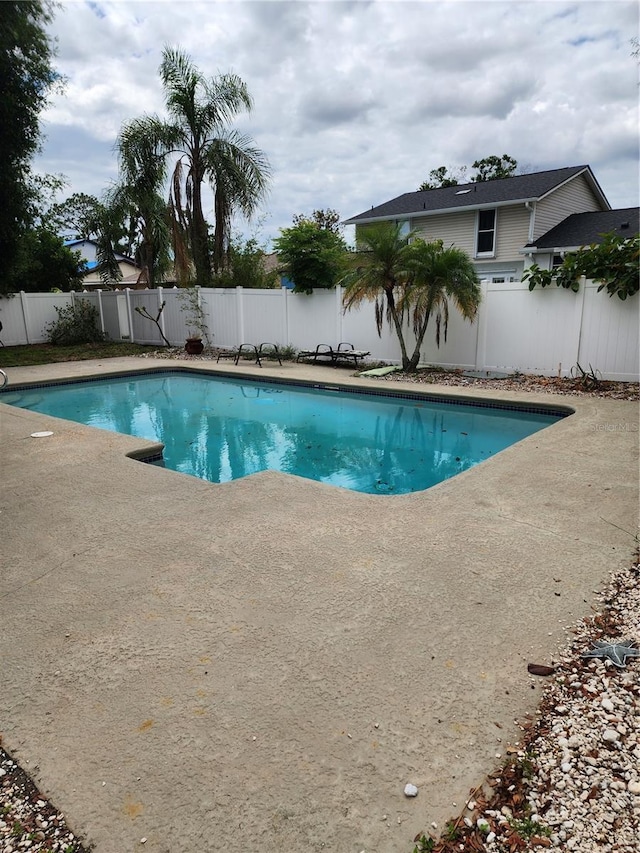 6906 Shady Pl, Tampa, FL 33634 - view of pool featuring a patio and a fenced backyard