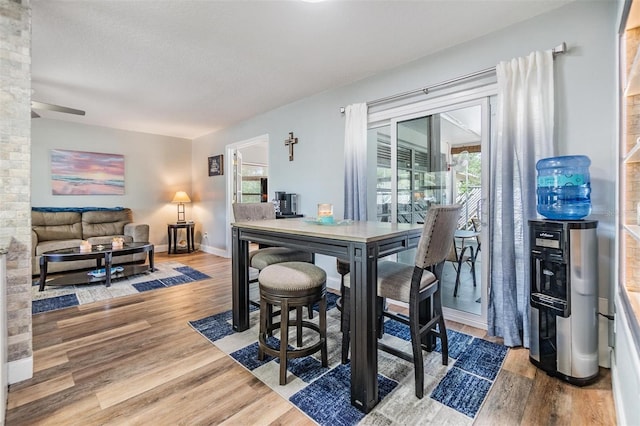 1225 15th St, Palm Harbor, FL 34683 - dining room with plenty of natural light and wood finished floors