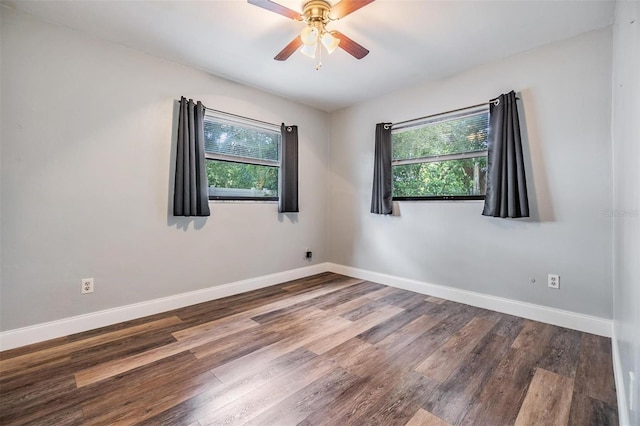 1225 15th St, Palm Harbor, FL 34683 - unfurnished room featuring plenty of natural light, wood finished floors, and a ceiling fan