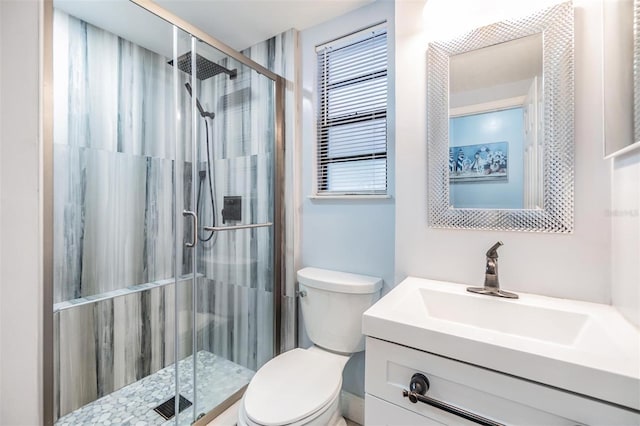 1225 15th St, Palm Harbor, FL 34683 - bathroom with toilet, a shower stall, and vanity