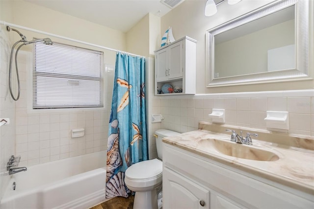 1225 15th St, Palm Harbor, FL 34683 - full bath featuring tile walls, toilet, shower / tub combo, and vanity