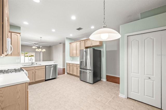 kitchen with stainless steel appliances, a sink, light brown cabinetry, recessed lighting, and light countertops