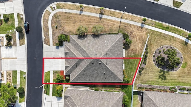 aerial view of property and surrounding area with property boundaries highlighted
