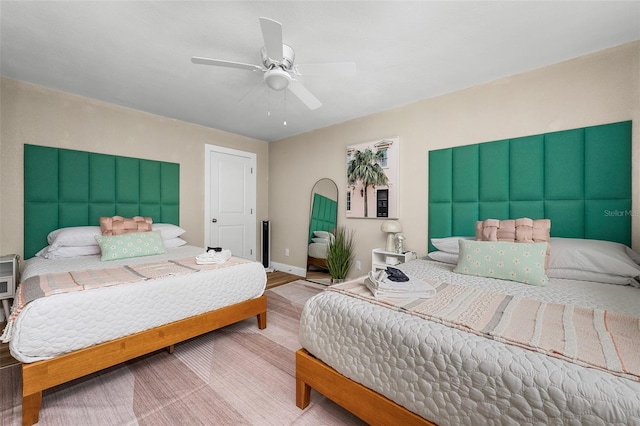 616 11th St NW, Largo, FL 33770 - bedroom with a ceiling fan and baseboards