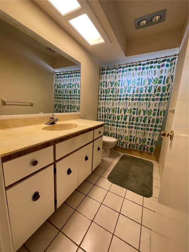 8209 Chaucer Dr, Weeki Wachee, FL 34607 - bathroom with vanity and tile patterned flooring