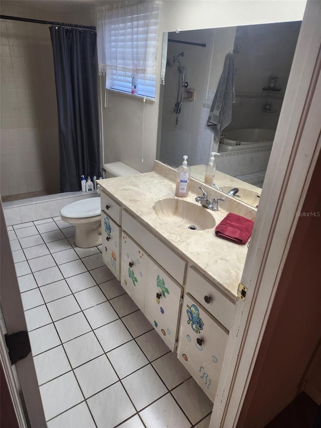 8209 Chaucer Dr, Weeki Wachee, FL 34607 - full bath with tile patterned floors, vanity, and shower / tub combo