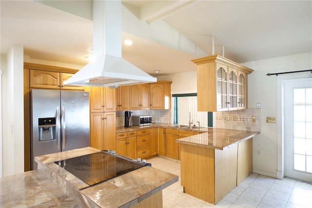 8209 Chaucer Dr, Weeki Wachee, FL 34607 - kitchen featuring appliances with stainless steel finishes, island exhaust hood, a peninsula, glass insert cabinets, and decorative backsplash
