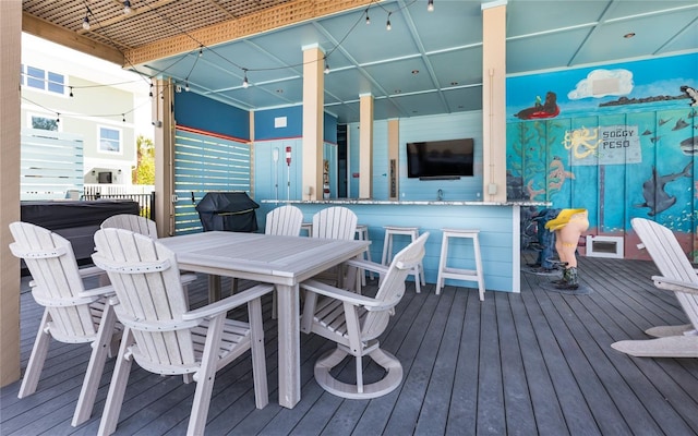 4620 Oro Pesos Ln, Captiva, FL 33924 - wooden deck featuring outdoor dining area
