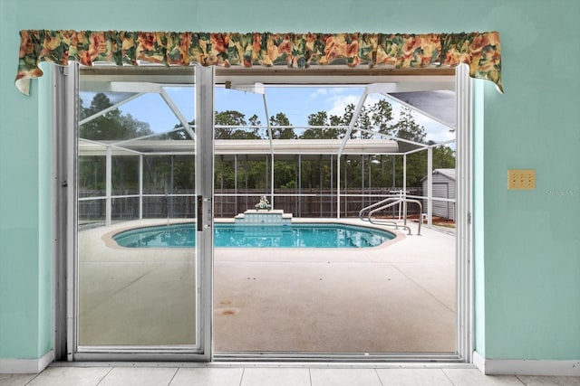 swimming pool featuring a storage shed, a patio, an outdoor structure, and glass enclosure