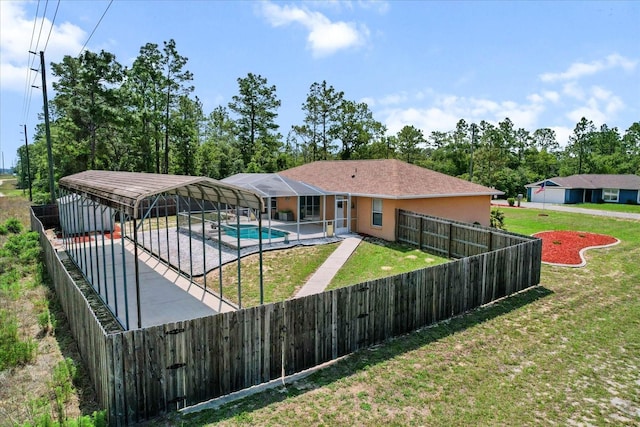 back of house with glass enclosure, a patio, and stucco siding