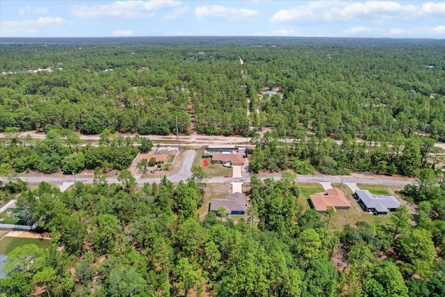 aerial overview of property's location with a forest