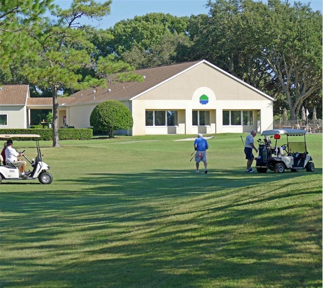 view of community featuring a yard