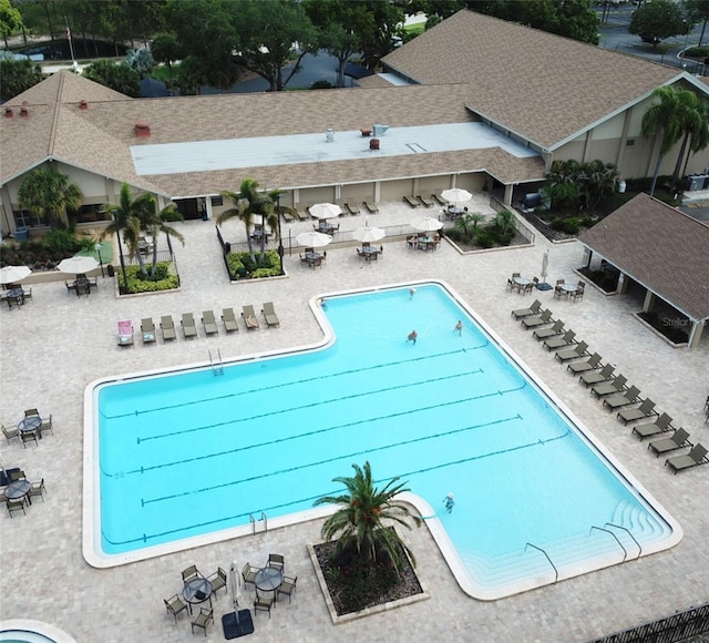 community pool with a patio