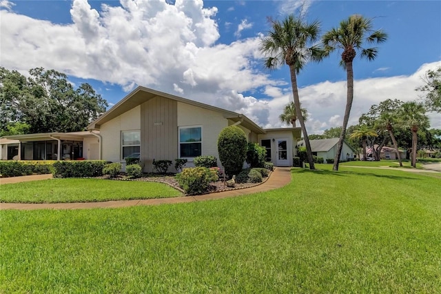 view of front of property with a front lawn