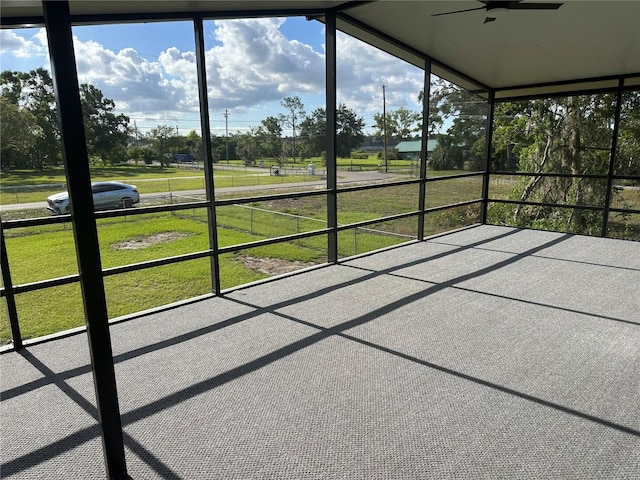 11729 John Robbins Rd, Riverview, FL 33578 - unfurnished sunroom featuring a ceiling fan