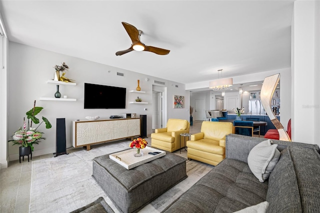 1325 Snell Isle Blvd NE Unit 810, Saint Petersburg, FL 33704 - living area with a chandelier and a ceiling fan